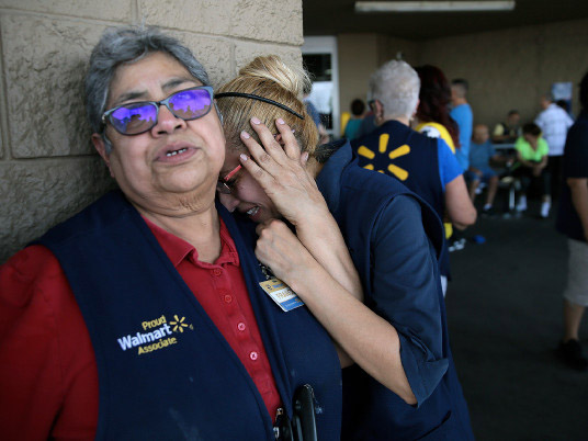 Wal-Mart employees. Photo credit: The Denver Post