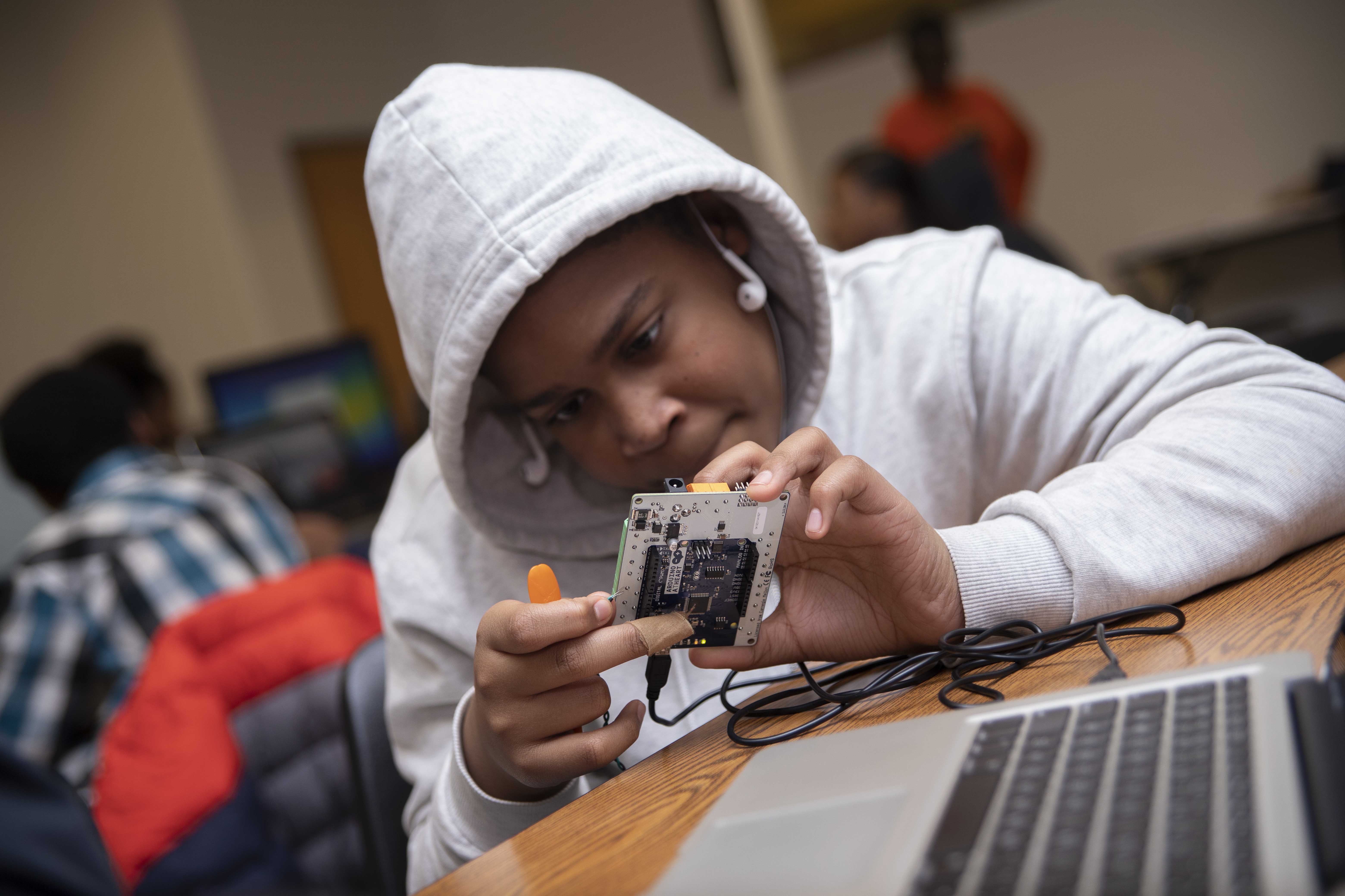 Student working on computing project.