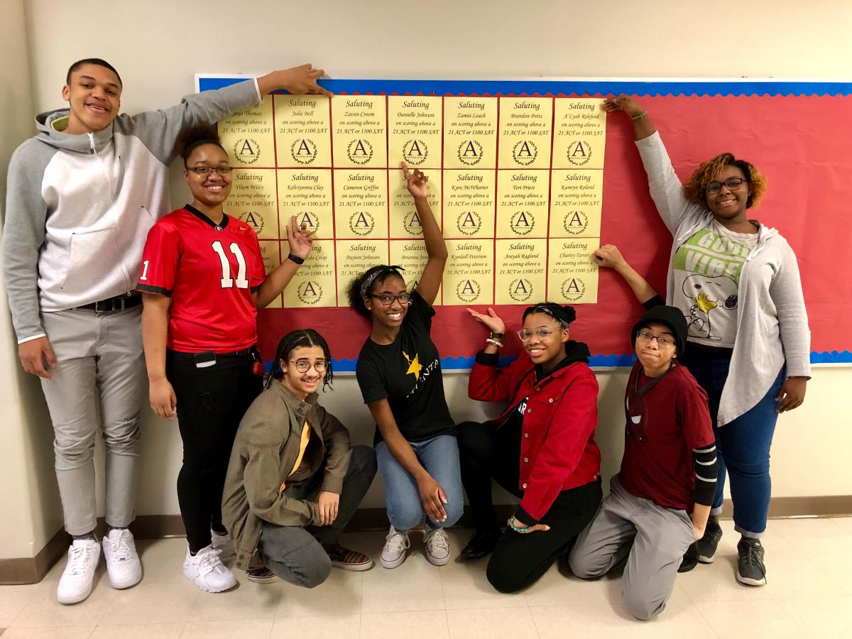 Students celebrate receiving good scores on their SAT and ACT